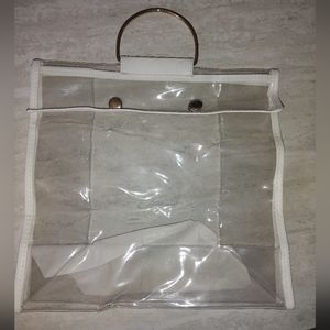 Clear bag with Gold color handle